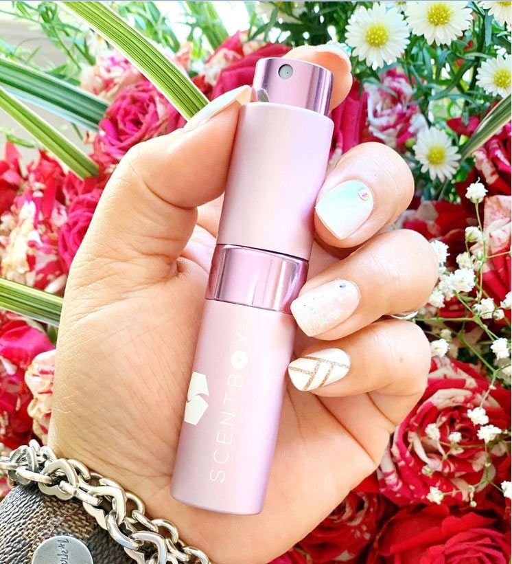 ScentBox monthly subscription box with 8ml designer fragrance vial in elegant packaging